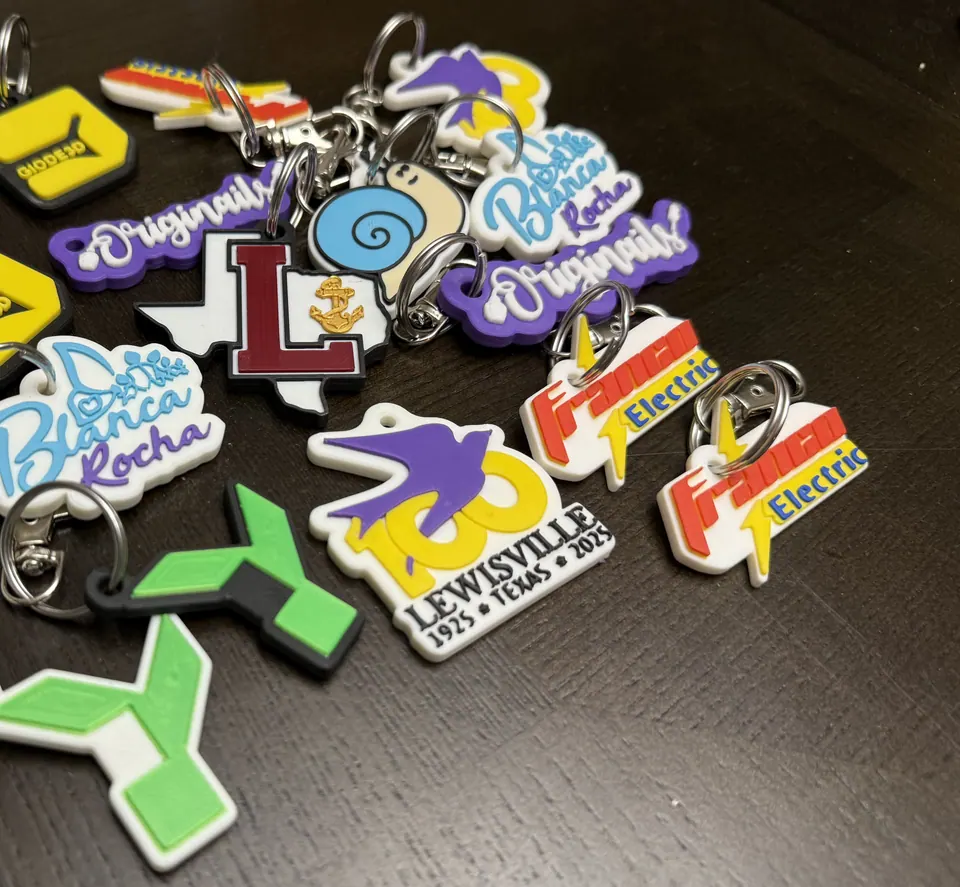 About 13 customer keychains: Franco Electric, Blanca Rocha, Originails, Lewisville and more